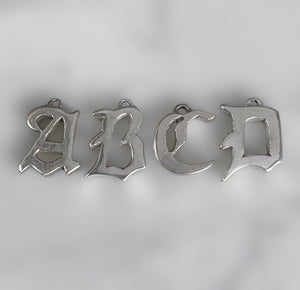 Old English initial charm letters A B C D 